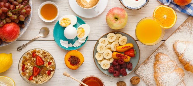 Continental breakfast menu on woden table Continental breakfast menu on woden table