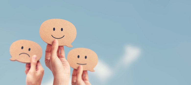 Customer showing rating with happy icon on sky background, Custo