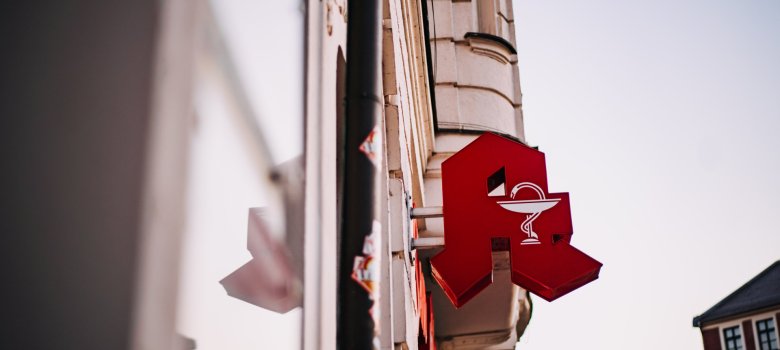 German pharmacy displaying the traditional pharmacy sign used in the country.