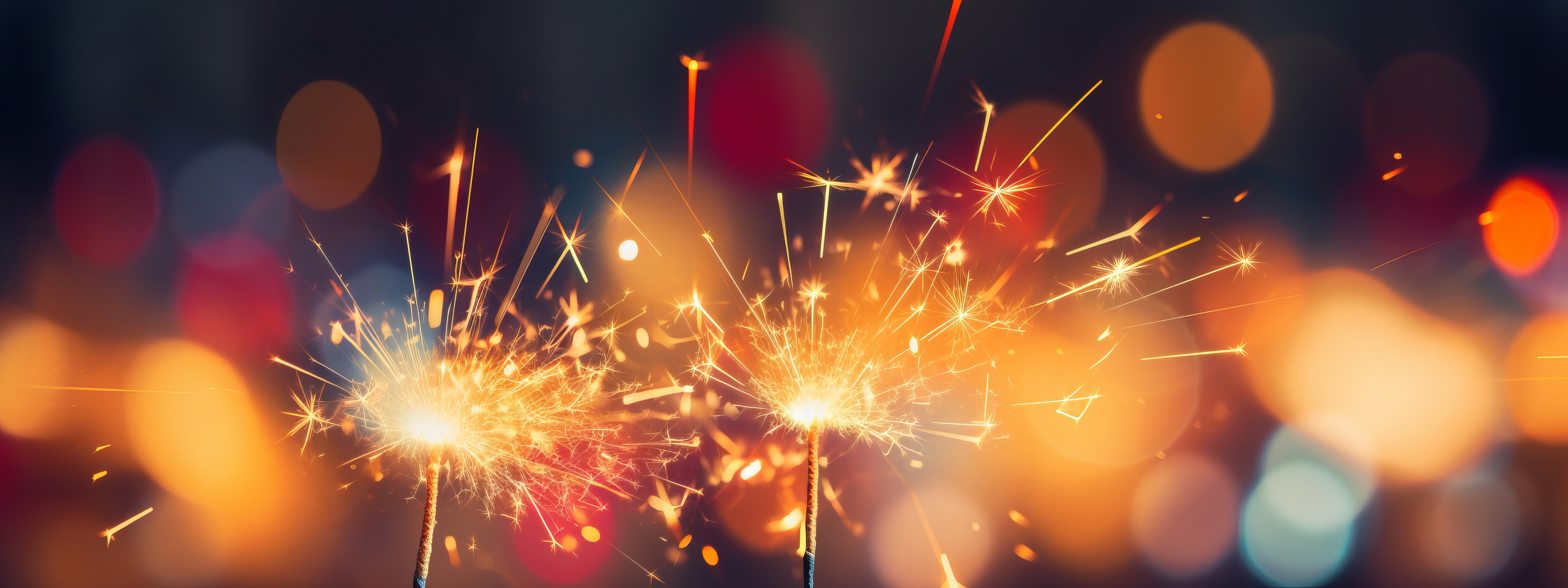 Sylvester New Year, New Year's Eve 2024 party event celebration holiday greeting card - Closeup of sparkling sparklers and bokeh lights in the background