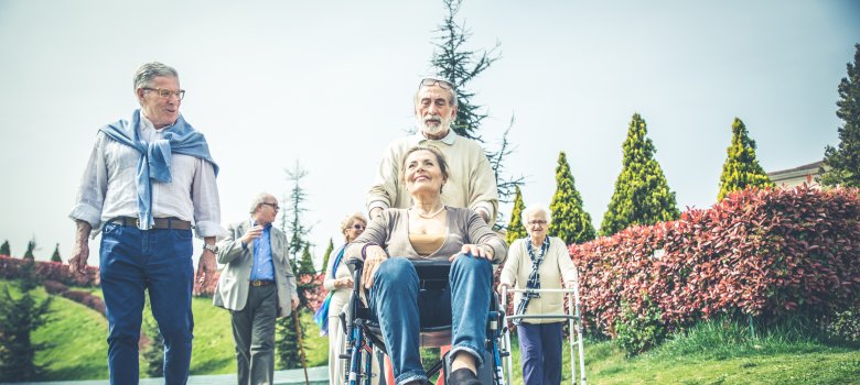 Senior people walking outdoors