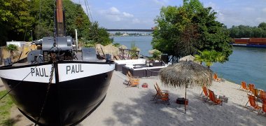 Beach bar with Eel Fishing Boat “Paul”
