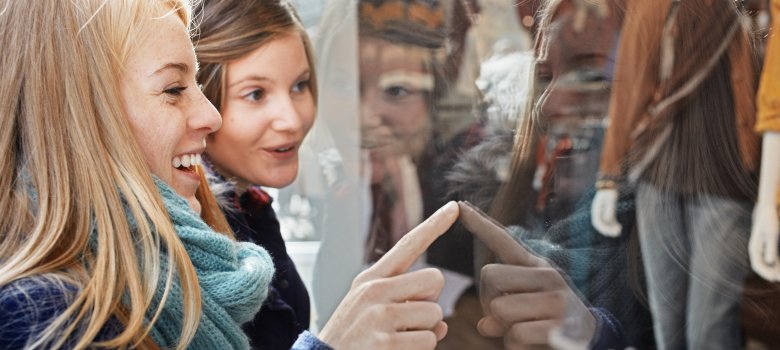 two young women shopping